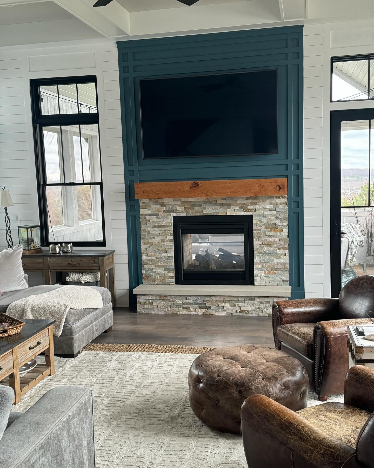Custom teal craftsman fireplace remodel by ADR Construction