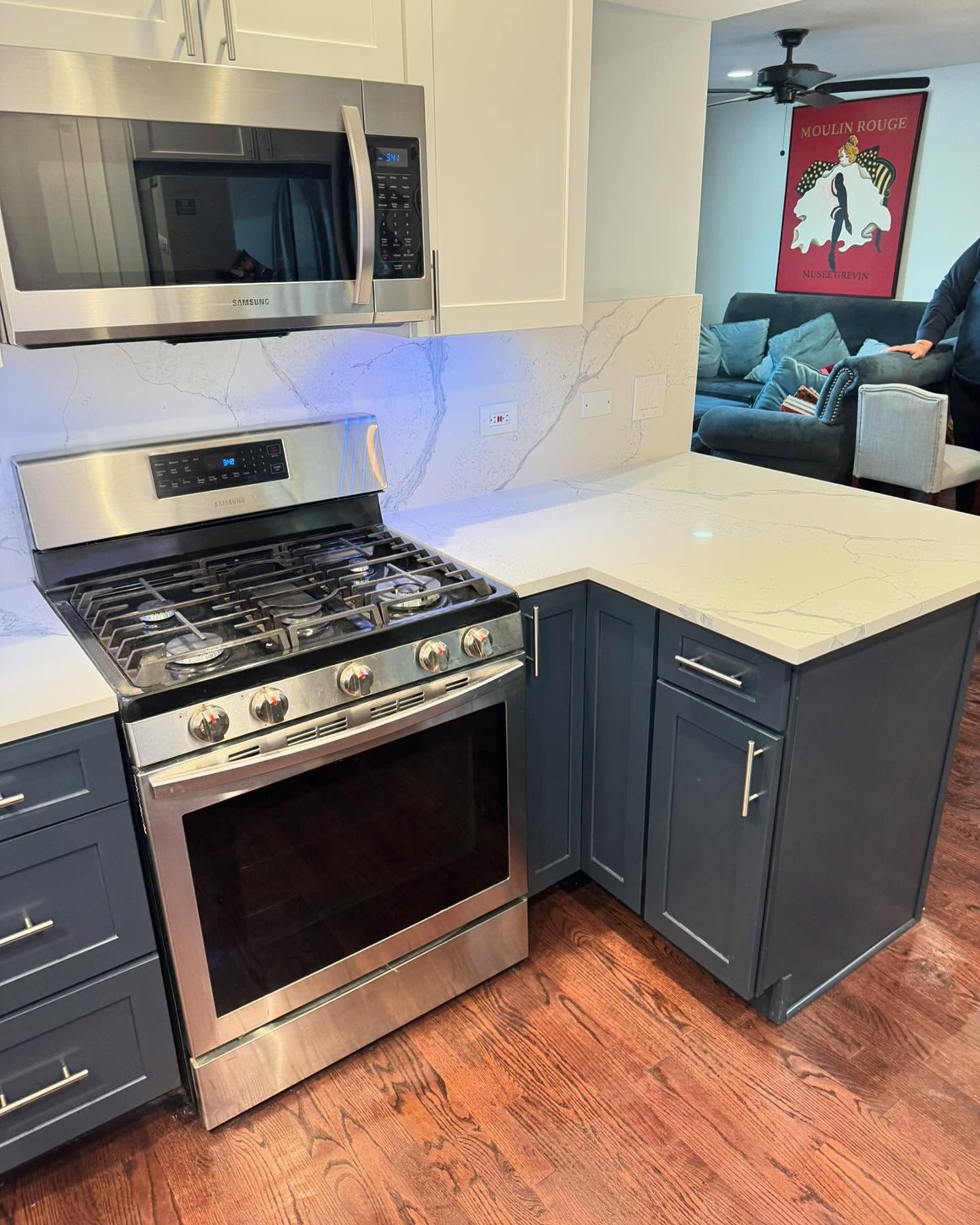 Two-tone kitchen with under-cabinet lighting by ADR Construction